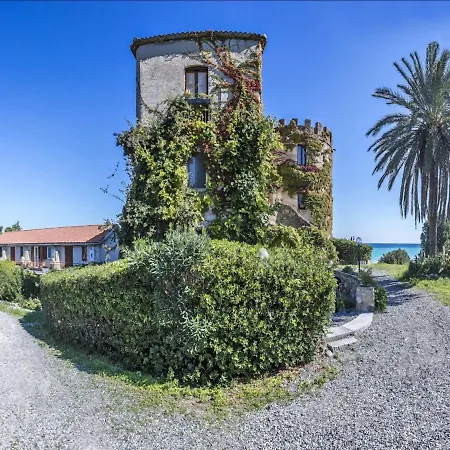 Historical In Calabria With Colourful Garden