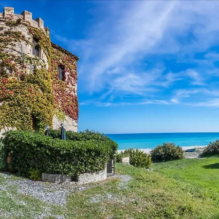Historical In Calabria With Colourful Garden